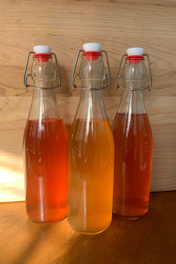 glass bottles filled with water kefir